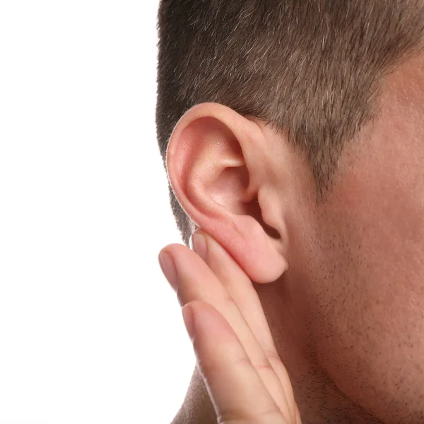 Man Showing Hand Ear Gesture White Background Closeup — стоковое фото