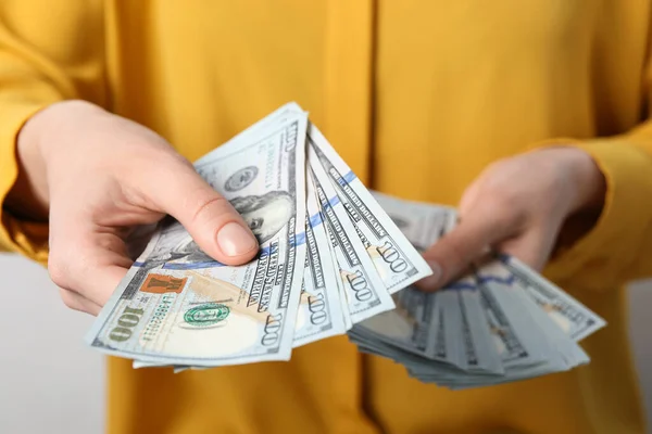 Woman Counting Dollar Banknotes Light Background Closeup — Stock Photo, Image