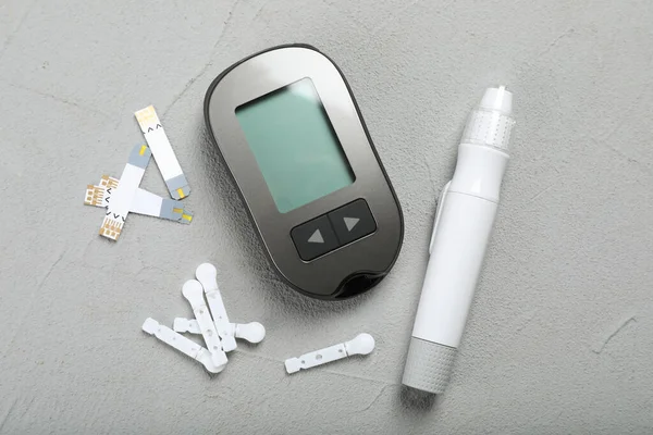 Glucometer Lancet Pen Strips Grey Table Flat Lay Diabetes Testing — Stock Fotó