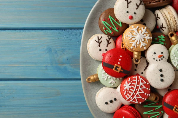 Beautifully Decorated Christmas Macarons Light Blue Wooden Table Top View — ストック写真