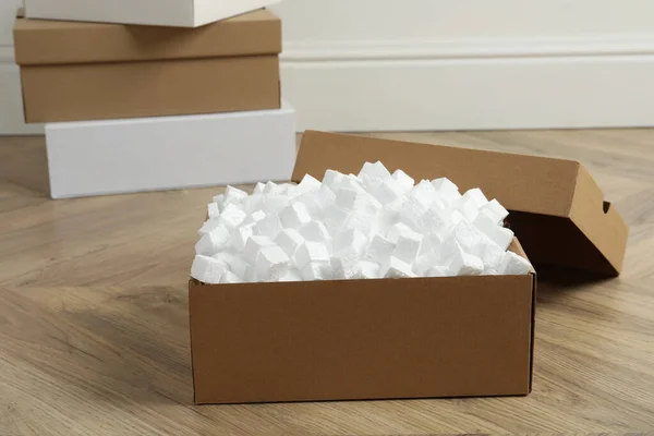 Cardboard Box Styrofoam Cubes Wooden Floor Indoors — ストック写真