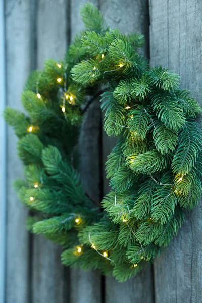 Beautiful Christmas Wreath String Lights Hanging Wooden Wall — 스톡 사진