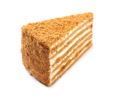 Beyaz üzerine izole edilmiş bir dilim lezzetli ballı pasta.