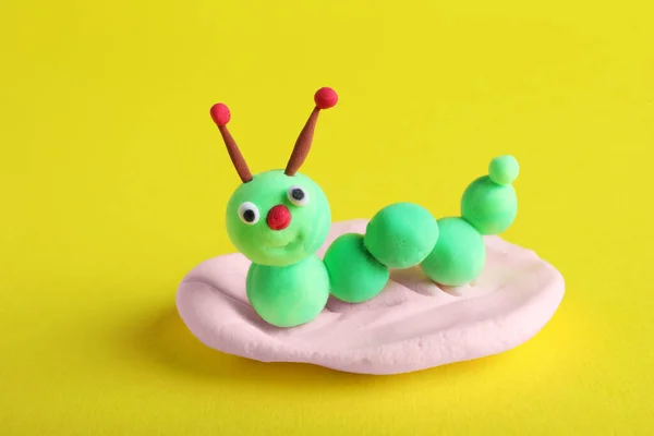 Colorful Caterpillar Made Play Dough Yellow Background Closeup — Zdjęcie stockowe