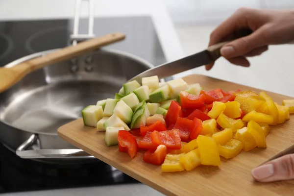 Woman Putting Cut Vegetables Saute Pan Kitchen Closeup — Stock Fotó