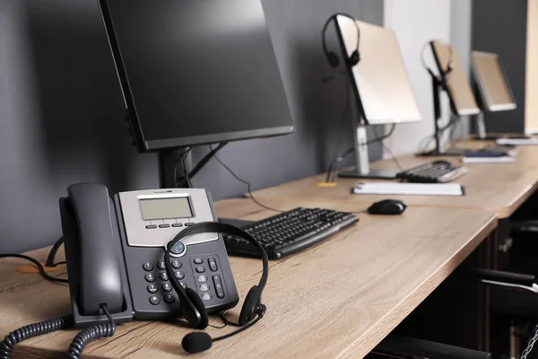 Stationary Phone Headset Modern Computer Wooden Desk Office Hotline Service — Fotografia de Stock