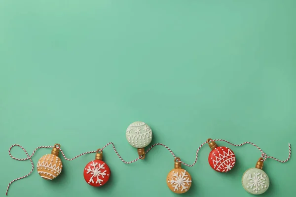 Beautifully Decorated Christmas Macarons Rope Turquoise Background Flat Lay Space —  Fotos de Stock