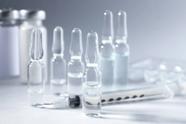 Pharmaceutical Ampoules Syringe Light Grey Background — Stock Fotó