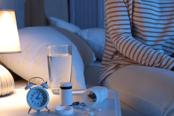 Woman Nightstand Pills Water Alarm Clock Bedroom Night Closeup — Foto Stock