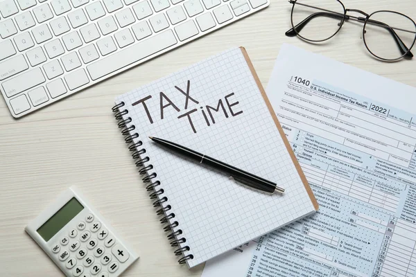 Notebook Words Tax Time Documents Keyboard Calculator White Wooden Table — Fotografia de Stock