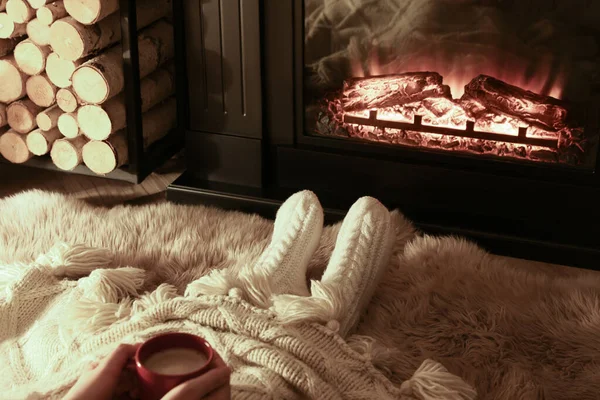 Woman Hot Drink Resting Fireplace Home Closeup — стоковое фото
