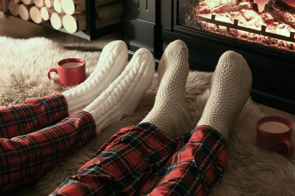 Couple Knitted Socks Fireplace Home Closeup Legs — Stock Photo, Image