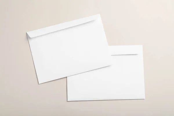 White Paper Envelopes Beige Background Flat Lay — Fotografia de Stock