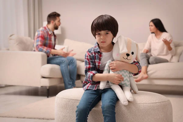 Sad Little Boy Toy His Arguing Parents Sofa Living Room — Stock Photo, Image