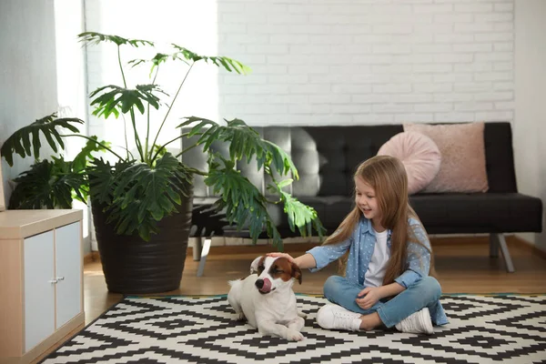 Cute Little Girl Her Dog Carpet Home Space Text Childhood — Stock Fotó