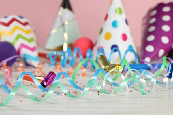 Colorful Serpentine Streamers Other Party Accessories White Wooden Table Closeup — Fotografia de Stock