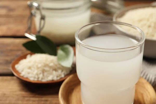 Vaso Agua Arroz Sobre Mesa Madera Primer Plano —  Fotos de Stock