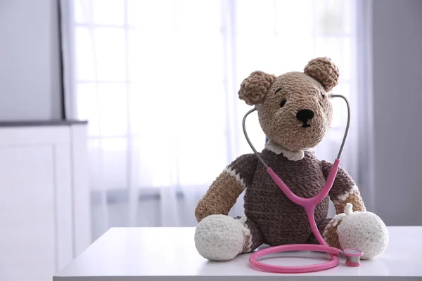 Cute Toy Bear Stethoscope White Table Indoors Space Text Children — Zdjęcie stockowe