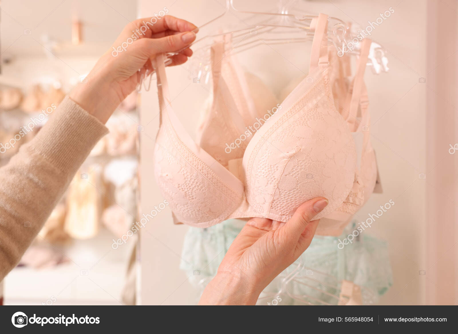 Woman Choosing Bra Lingerie Store Closeup Stock Photo by ©NewAfrica  565948054