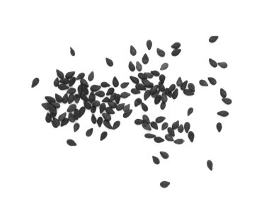 Beyaz arkaplanda dağınık siyah susam tohumları, üst görünüm