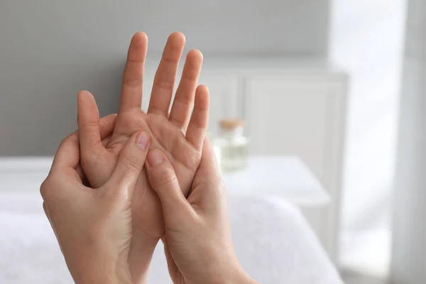 Woman Receiving Hand Massage Wellness Center Closeup — Stock Photo, Image