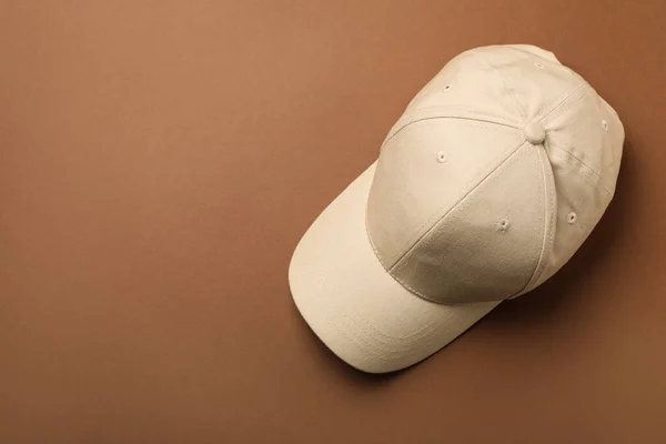 Baseball Cap Brown Background Top View Space Text — Foto Stock