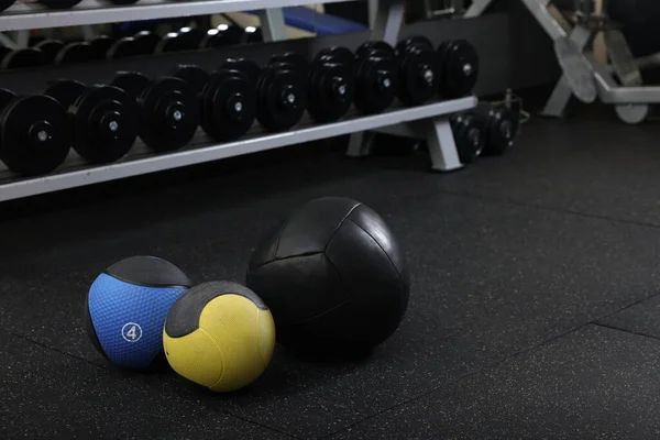 Different Medicine Balls Floor Gym — стоковое фото