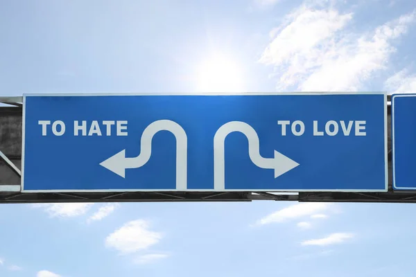 Road Sign Different Directions Hate Love Outdoors — Foto Stock