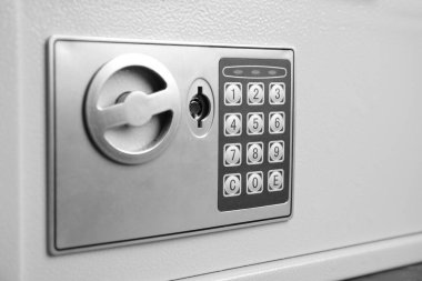 Closed steel safe with electronic lock, closeup