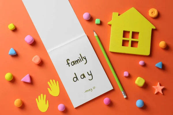 Happy Family Day Flat Lay Composition Notebook House Model Orange — Fotografia de Stock