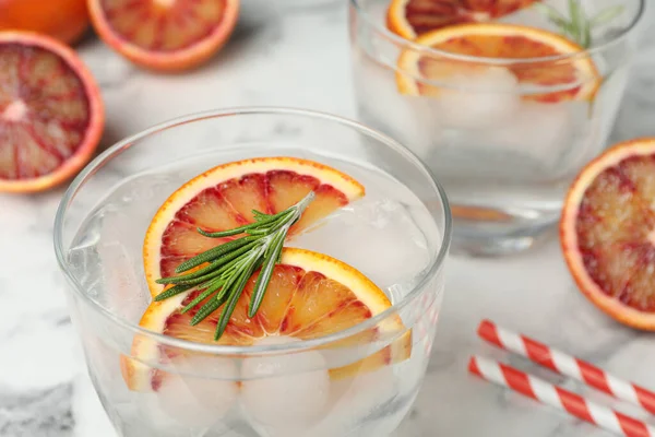Delicious Refreshing Drink Sicilian Orange Rosemary White Marble Table Closeup — стоковое фото