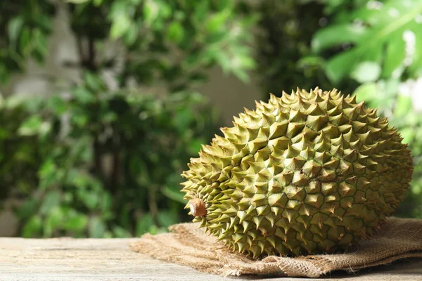 Ripe Durian Wooden Table Blurred Background Space Text — Zdjęcie stockowe