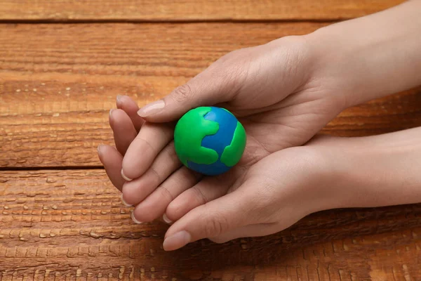 Happy Earth Day Woman Plasticine Planet Wooden Table Closeup — Stock Fotó