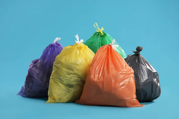 Trash Bags Full Garbage Light Blue Background — Fotografia de Stock