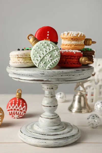 Stand Beautifully Decorated Christmas Macarons White Wooden Table — Stock fotografie