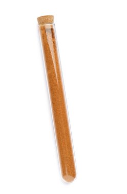 Glass tube with ground red pepper on white background, top view
