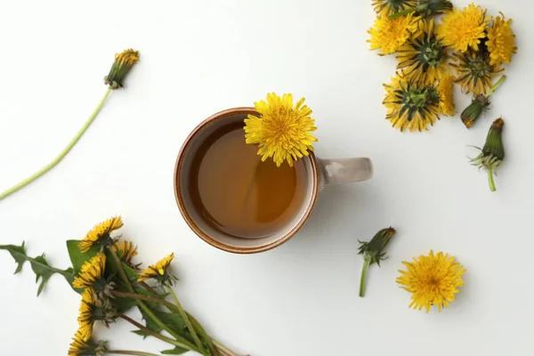 Delicious Fresh Tea Beautiful Dandelion Flowers White Background Top View — Foto Stock