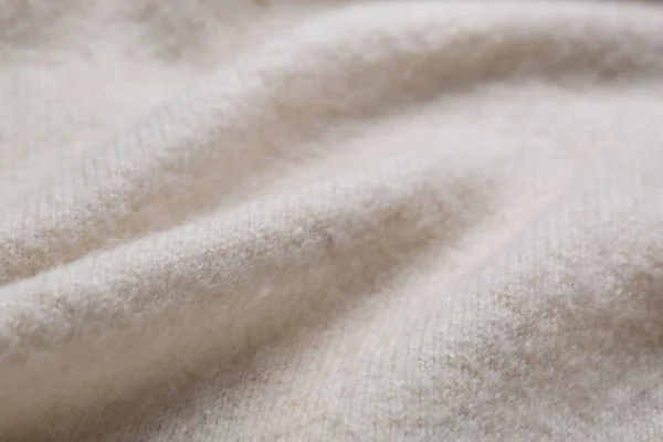 软米色针织物为背景 — 图库照片