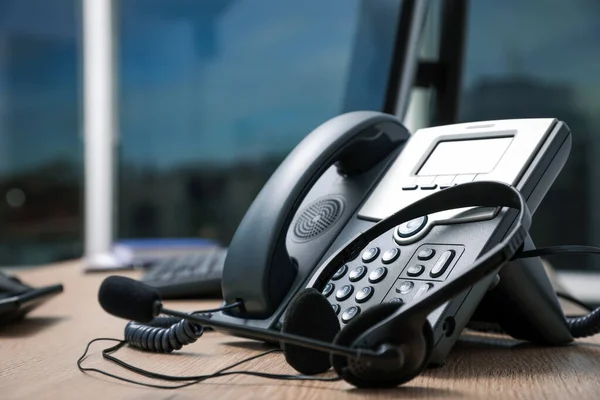 Stationary Phone Headset Wooden Desk Indoors Closeup Hotline Service — Stockfoto