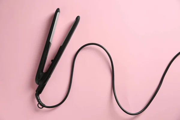 Modern Flat Hair Iron Pink Background Top View — 스톡 사진
