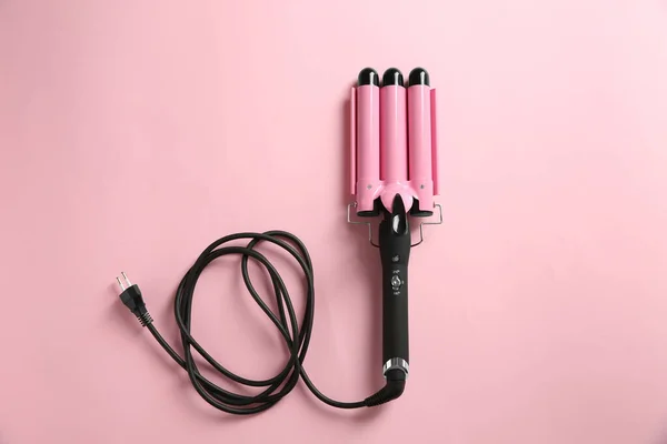 Modern Triple Curling Hair Iron Pink Background Top View — Stockfoto