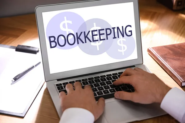 Bookkeeping Concept Man Working Laptop Wooden Table Closeup — Stockfoto