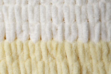 Arka plan olarak yumuşak örülmüş kumaş, üst görünüm