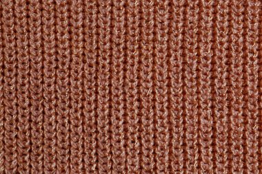 Arka plan olarak kahverengi örülmüş kumaş, üst görünüm