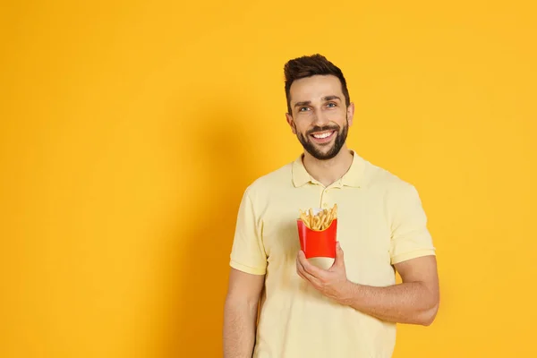 Man French Fries Yellow Background Space Text — Stock Photo, Image