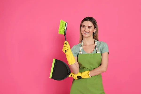 Young Woman Broom Dustpan Pink Background Space Text — Zdjęcie stockowe
