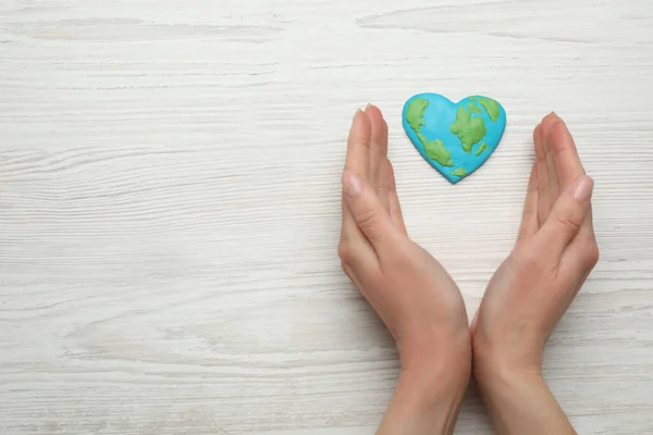 Happy Earth Day Woman Heart Shaped Plasticine Planet White Wooden — Fotografia de Stock