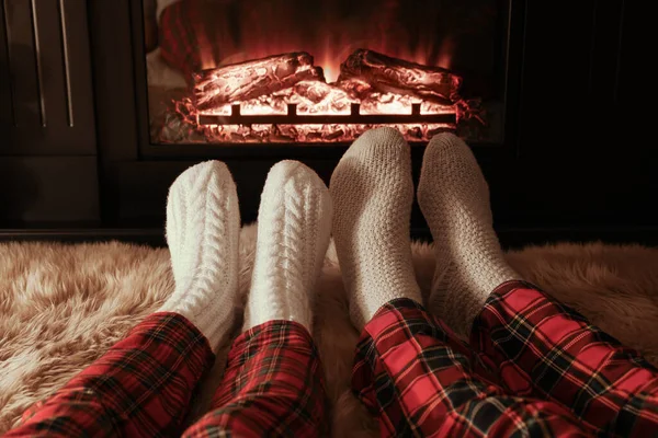 Couple Knitted Socks Fireplace Home Closeup Legs — Stock Photo, Image