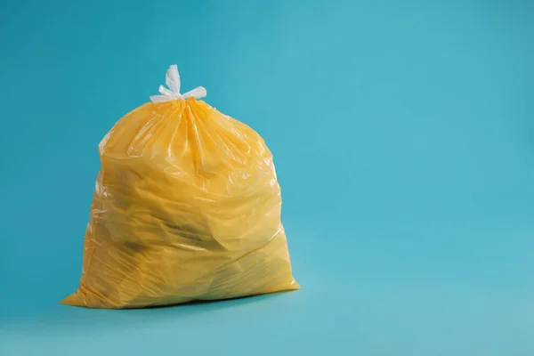 Trash Bag Full Garbage Light Blue Background Space Text — Stock Photo, Image