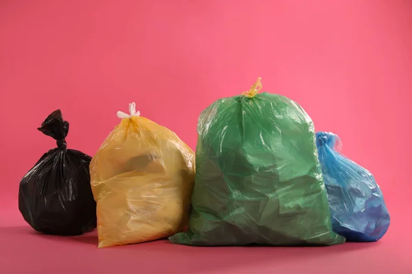 Trash Bags Full Garbage Pink Background — ストック写真